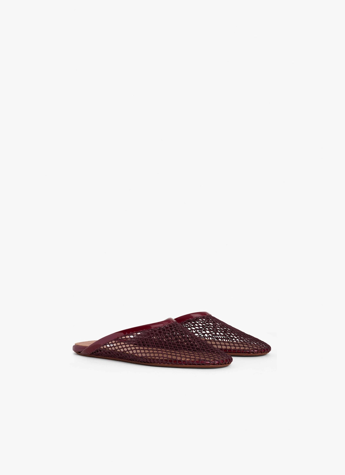 FLAT MULES IN FISHNET ALAÏA GARNET RED FLAT MULES IN FISHNET